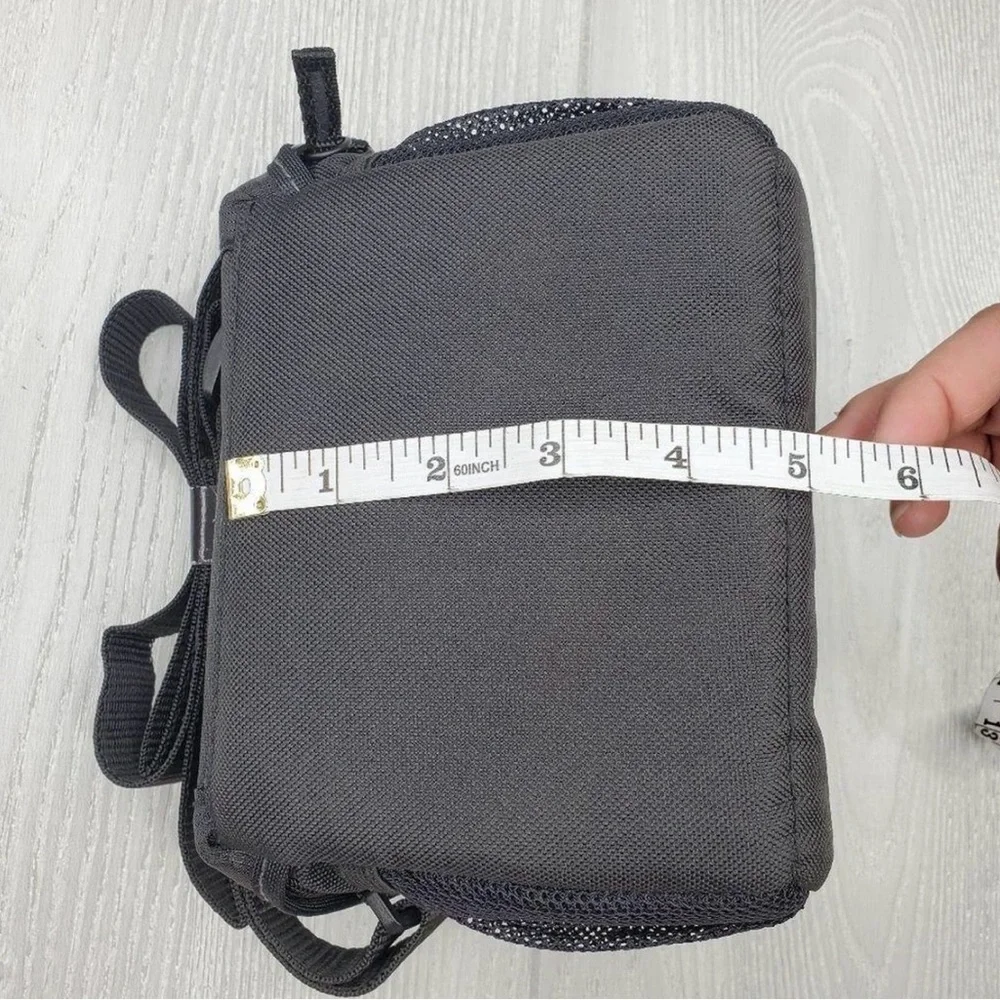 Sony black camera bag. Durable material. Secure strap and buckle. NWOT